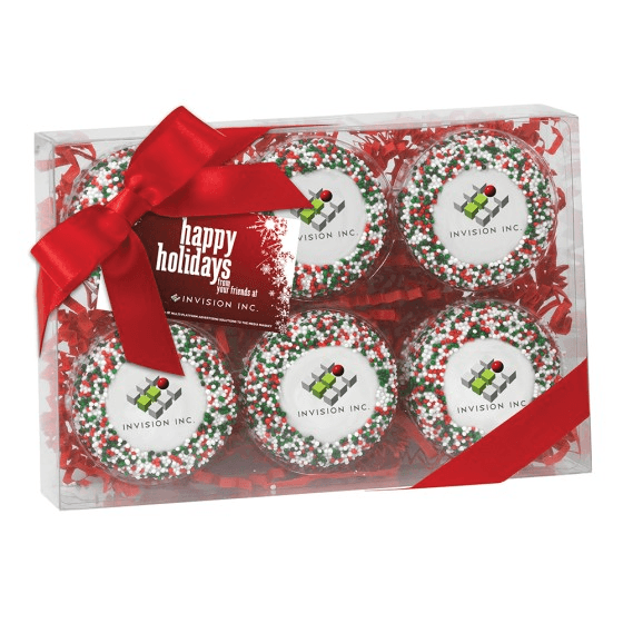 Six holiday sprinkled Oreo cookies printed with a company logo in a clear box with a red bow and hang tag